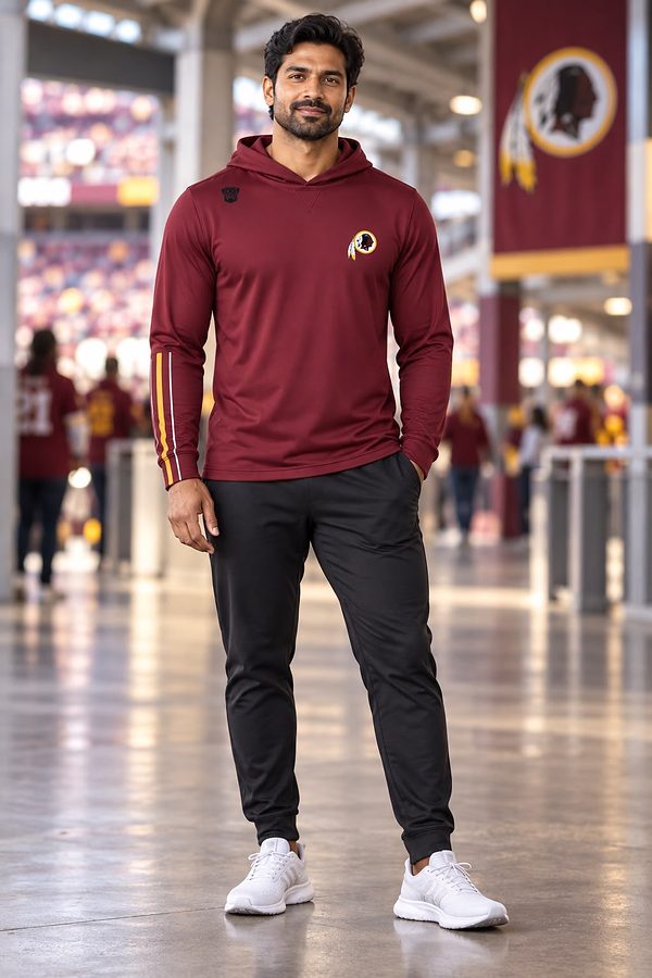 Worn with black joggers on the stadium concourse